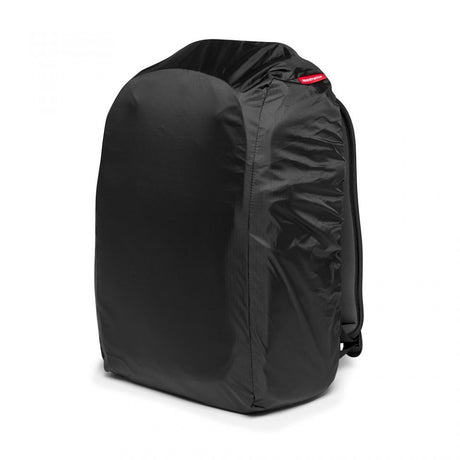 Black camera backpack back view with adjustable straps and small logo patch