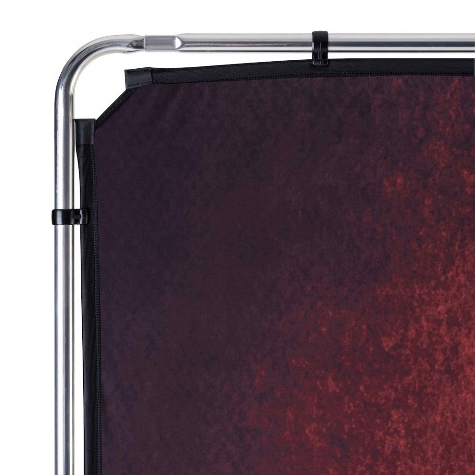 Backdrop frame corner with clamp and dark crimson fabric surface
