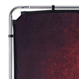 Backdrop frame corner with clamp and dark crimson fabric surface