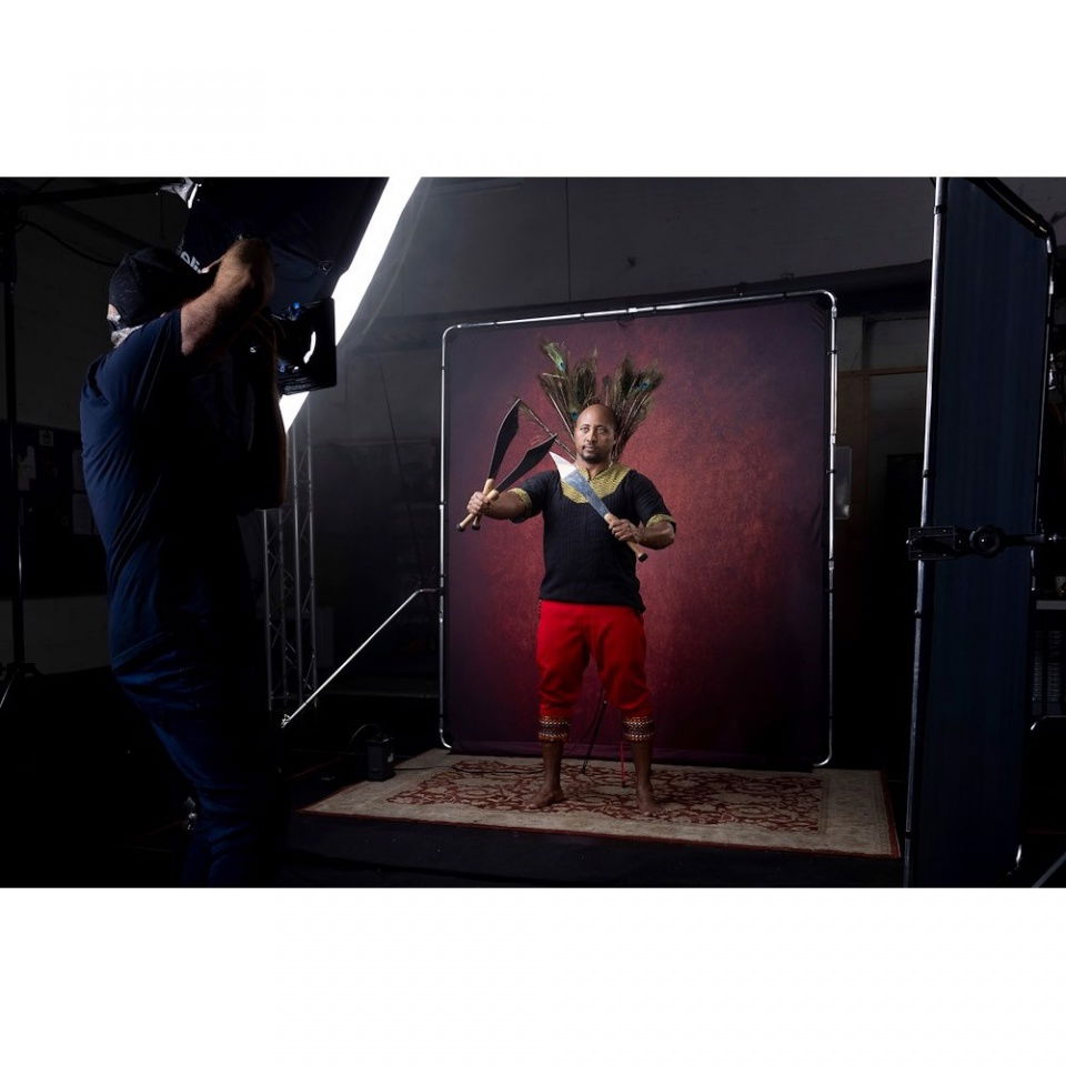 Crimson textured backdrop with metal frame in studio setup, 2 x 2.3 m