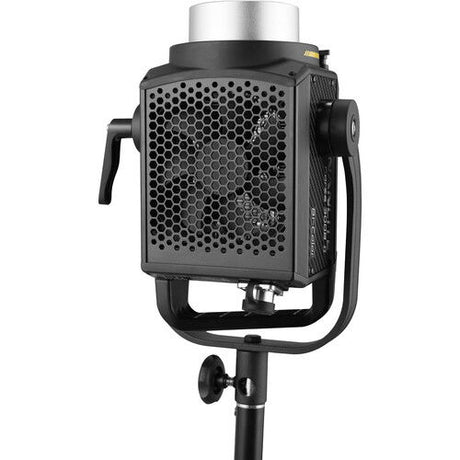 Bi-color LED monolight rear panel with honeycomb vent and side grip handles