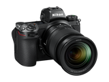 Mirrorless camera with 24-70mm lens, angled front view, top controls shown