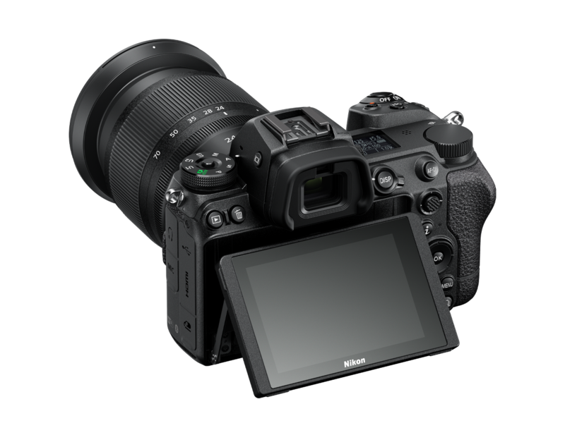 Mirrorless camera with 24-70mm lens, rear view, LCD tilted upward