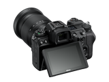 Mirrorless camera with 24-70mm lens, rear view, LCD tilted upward