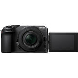 Mirrorless camera kit with 16-50mm lens and side grip, LCD facing out