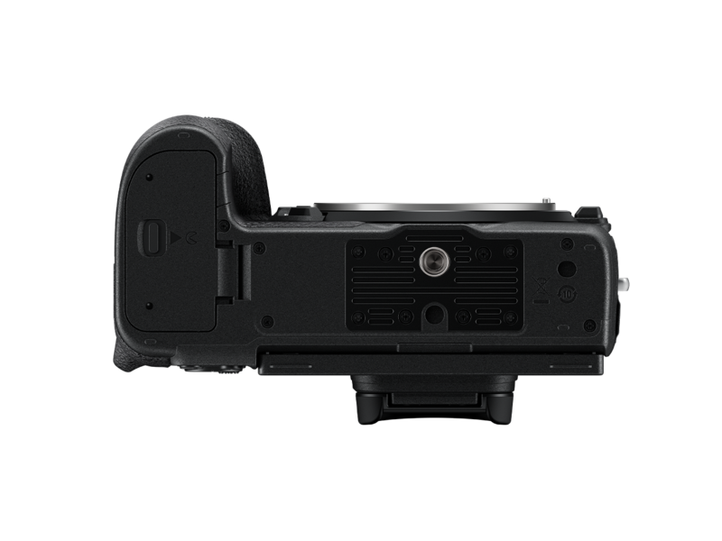 Mirrorless camera bottom view showing tripod mount and battery door