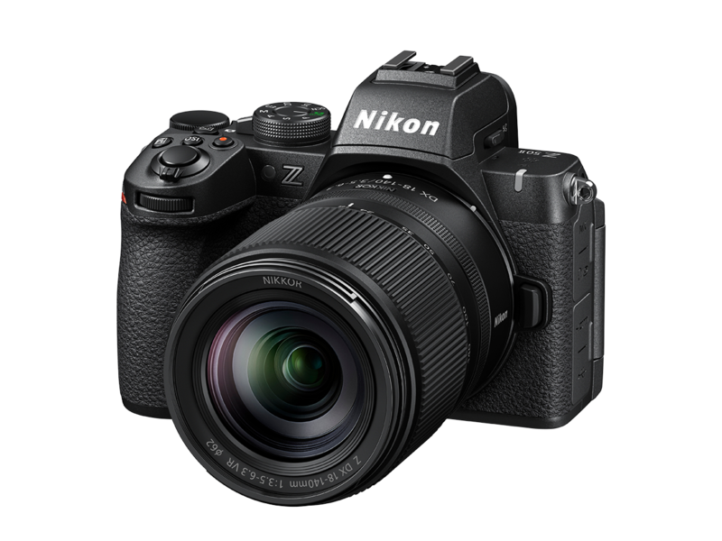 Mirrorless camera kit with 18-140mm VR zoom lens, front view with grip and controls