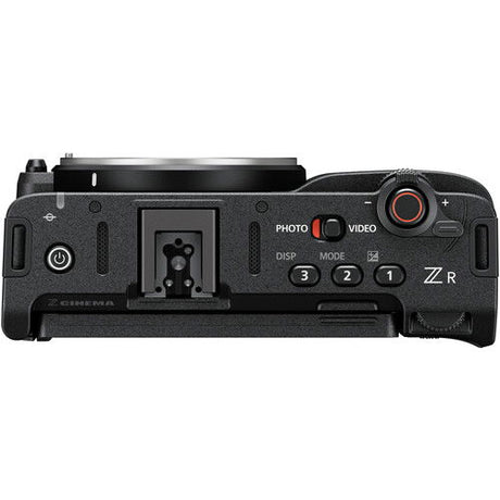 Top view of mirrorless camera body with mode buttons and REC control, black