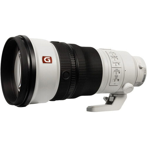 300mm f/2.8 telephoto lens with black ribbed focus ring and front lens hood