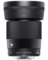 30mm f/1.4 DC DN camera lens, black barrel with front and markings Ø52