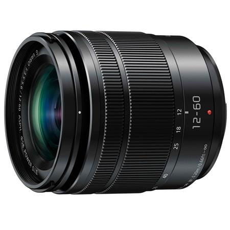 Side view of black 12-60mm camera lens barrel with ribbed focus ring