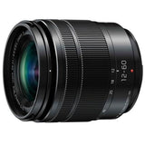 Side view of black 12-60mm camera lens barrel with ribbed focus ring