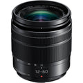 Black 12-60mm F3.5-5.6 camera lens with textured zoom/focus rings