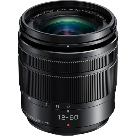 Black 12-60mm F3.5-5.6 camera lens with textured zoom/focus rings