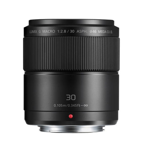 Black 30mm macro camera lens, ribbed focus ring and front glass