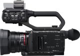 Rear camcorder view with SD slot panel, buttons, and zoom lens ring