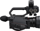 Camcorder rear I/O ports with two connector jacks and black shoulder mount strap