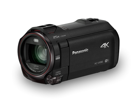 Black 4K camcorder front view with Leica lens and 25x zoom ring