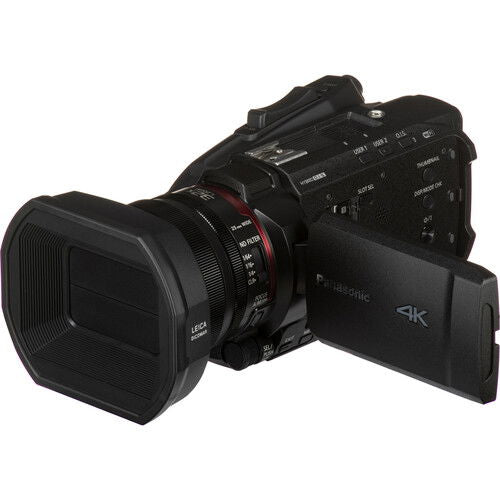 Black 4K camcorder side view with control panel and flip-out display