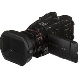 Black 4K camcorder side view with control panel and flip-out display