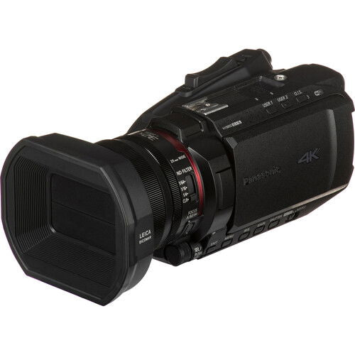 Black 4K camcorder angled view showing lens barrel and side I/O ports