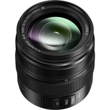 Black Micro Four Thirds 12-35mm f/2.8 lens front with glass element and filter ring
