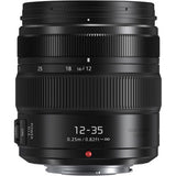12-35mm f/2.8 lens body with zoom scale, ribbed grip, and POWER switch