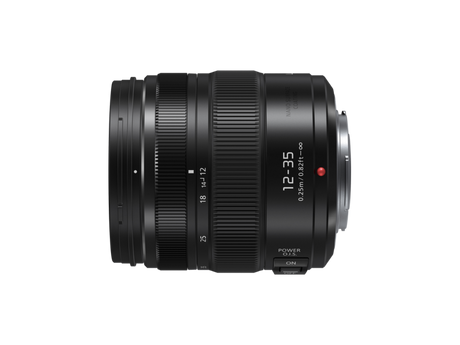 Side profile of 12-35mm f/2.8 lens with zoom scale numbers and red OIS indicator