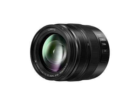 Black 12-35mm f/2.8 lens side with OIS markings and POWER ON/OFF slider