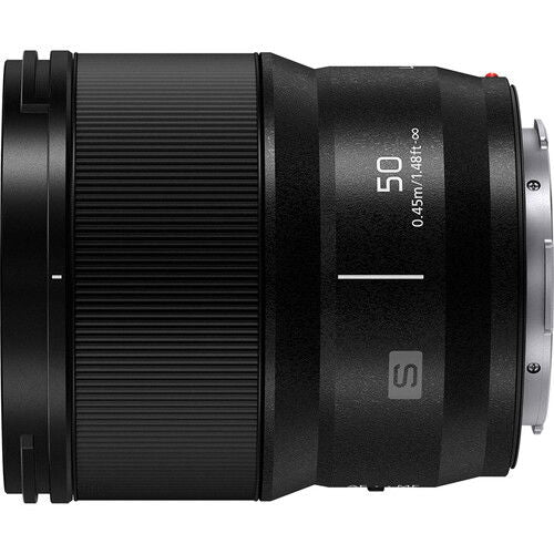 Black Lumix 50mm f/1.8 L-mount lens side markings visible