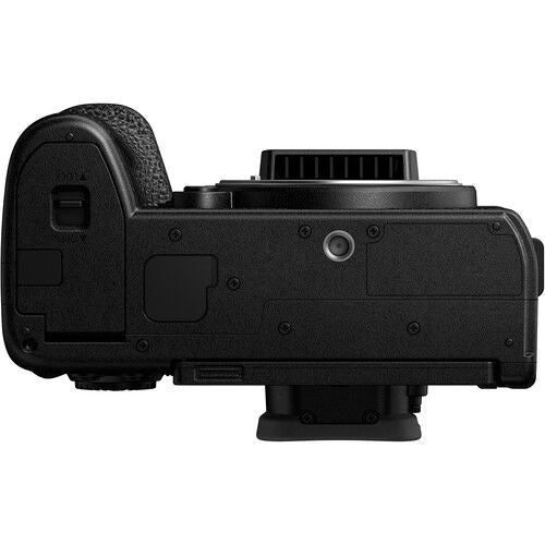 Black mirrorless camera side view with textured grip and body controls