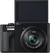 Black compact camera with LCD screen and front lens, front view