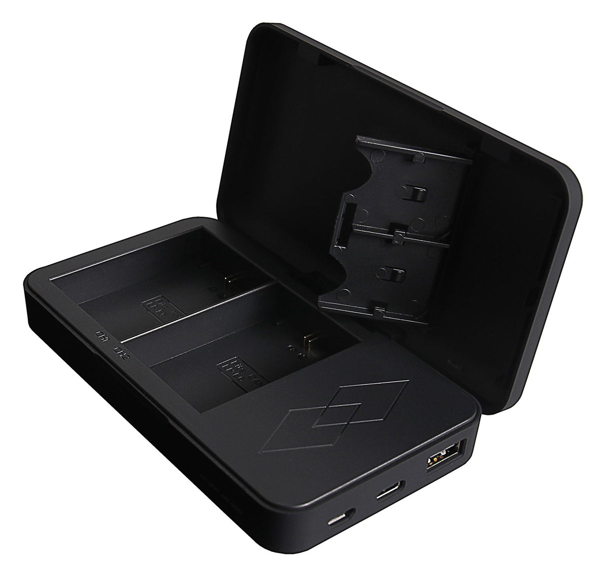Black dual charging dock open view with battery contacts and power connectors