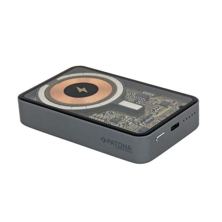 Wireless power bank top view showing copper coil and status light/connection ports