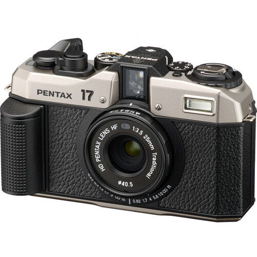 Pentax 17 film camera angled front view, black lens and dark silver top controls