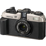 Pentax 17 film camera angled front view, black lens and dark silver top controls