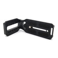 Black L-bracket with mounting plate, textured grips, and central threaded screw