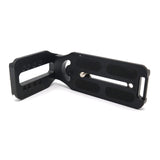 Black L-bracket with mounting plate, textured grips, and central threaded screw