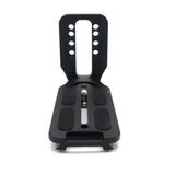 Front view of black L-plate bracket base with textured pads and center knob