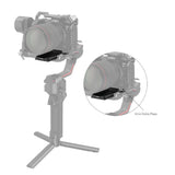 Camera rig with focus rod mount plate installed; close-up view of scale section