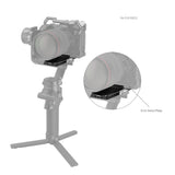 Camera mounted on gimbal with focus rod mount plate and scale detail
