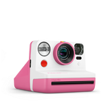 Rose instant photo camera angled view with lens and front flash visible