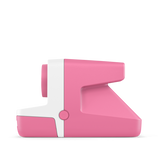 Rose and white instant camera side profile with button and molded grip