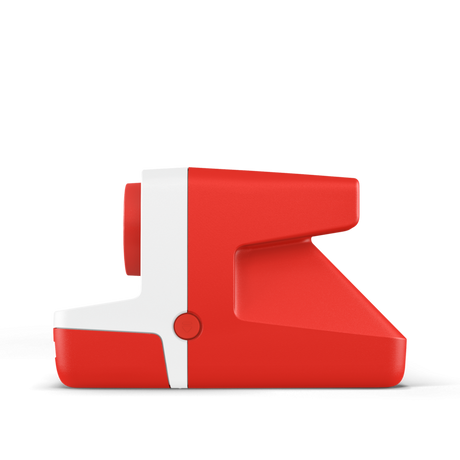 Red and white instant camera side view with grip and front control dial