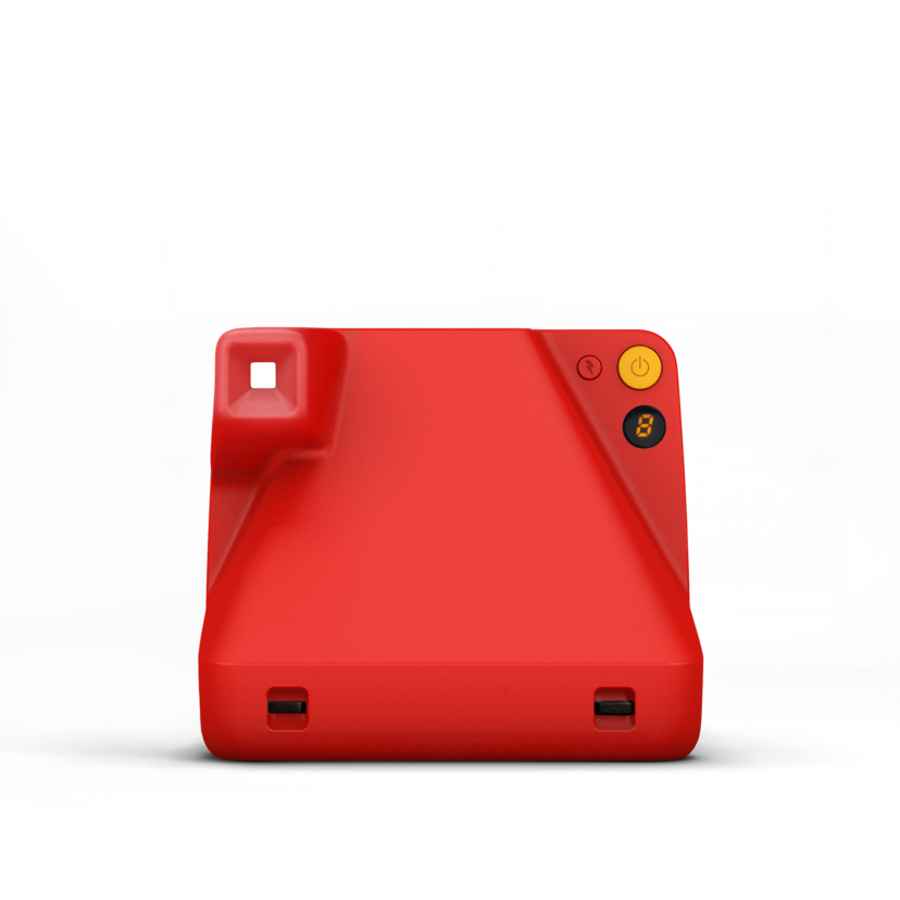 Red instant camera back view with ports and yellow power button