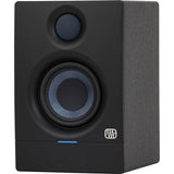 Black studio monitor speaker front corner view with tweeter grille and blue-ring woofer.