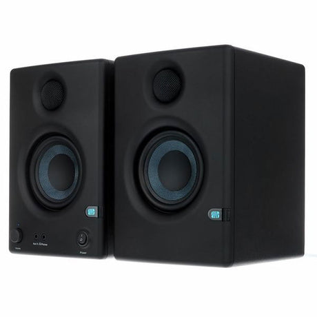 Black multimedia speakers, three-quarter view with tweeters and woofers facing forward