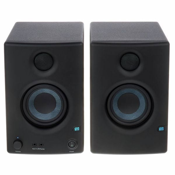 Black multimedia speakers, front view showing volume and power controls below woofers