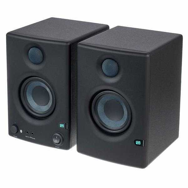 Pair of dark multimedia studio speakers with front woofers and tweeters