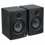 Studio monitor speaker pair in black, angled view showing tweeters and woofers